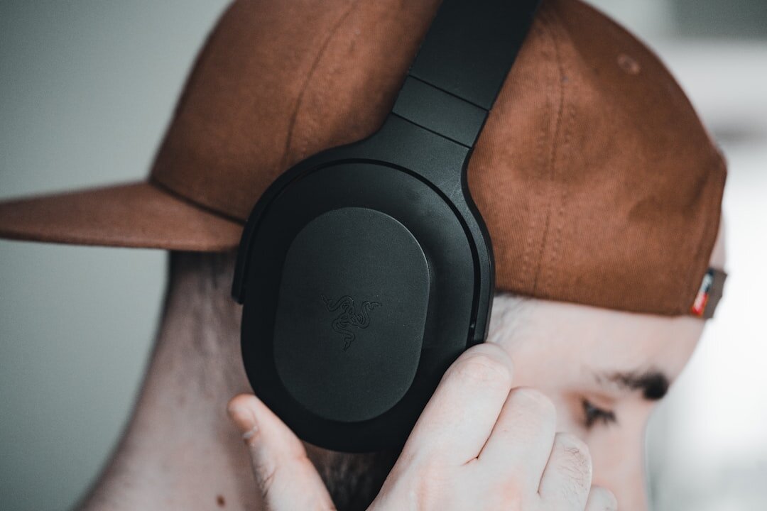 young person listening to headphones