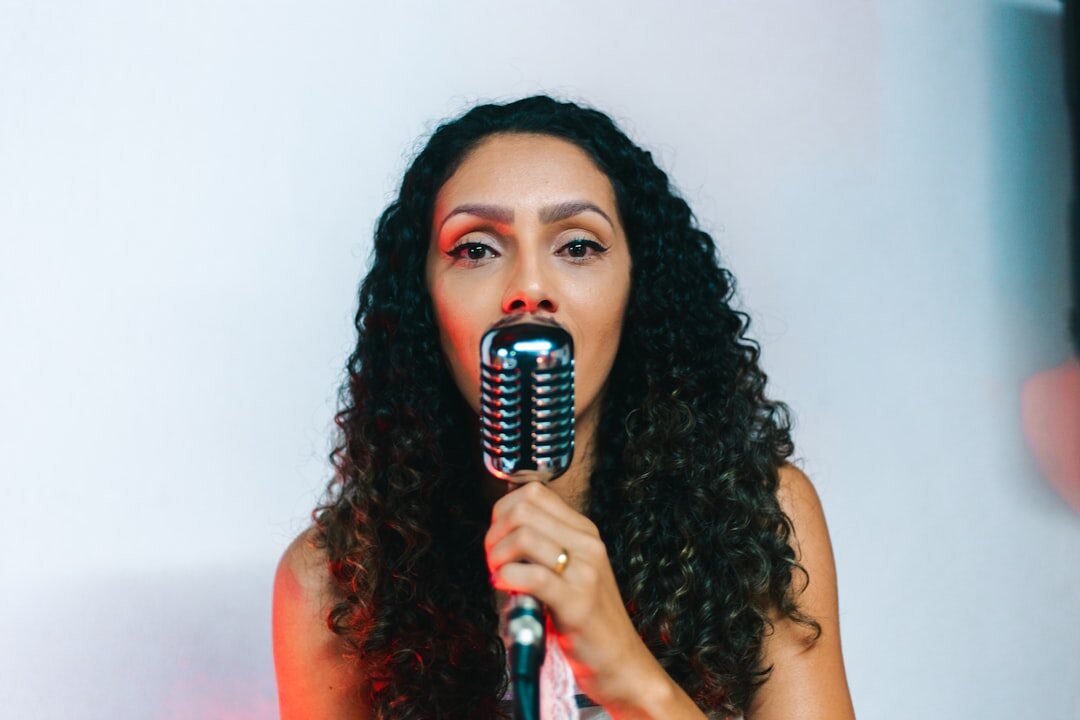 woman speaking into microphone